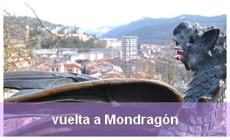 CC0 Ayuntamiento de Mondragón ~ Dragón del parque de santa Bárbara observando el núcleo urbano de Mondragón